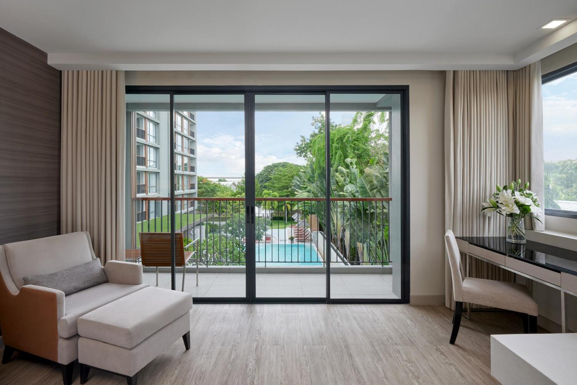 The Park Nine Hotel Suvarnabhumi Bangkok Pokoj fotografie A living room with a sliding door